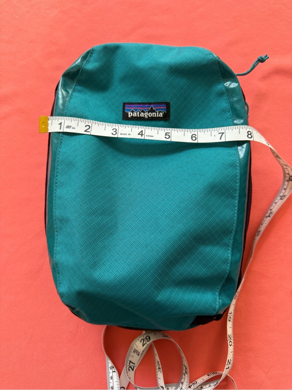 Patagonia Black Hole Cube 6L Teal with Purple, Orange, & Yellow Accents. - Picture 11 of 14